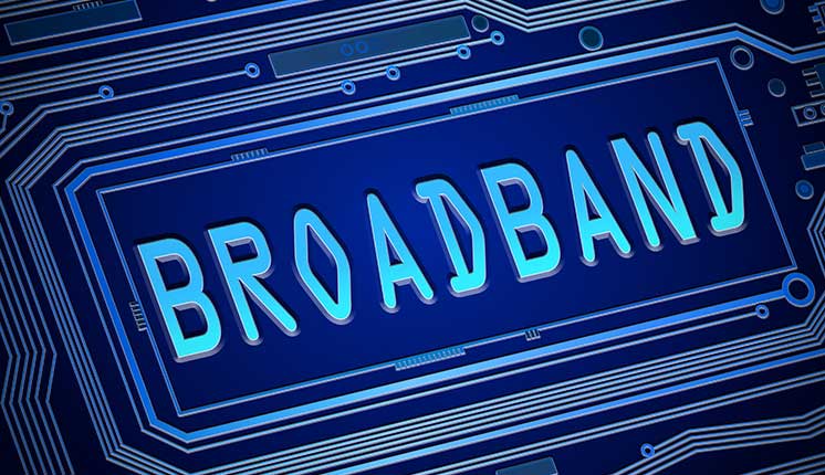 text: broadband set on blue background with lines around the word