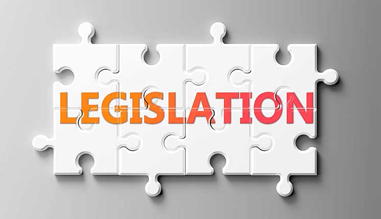 puzzle pieces joined together with color gradient word: Legislation