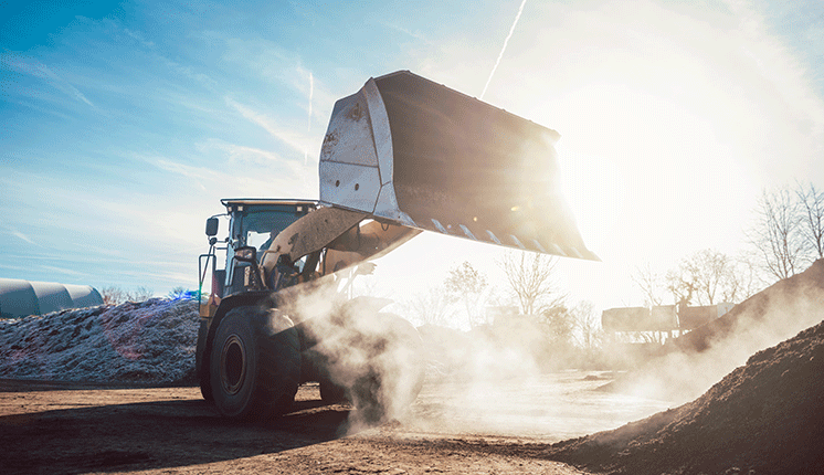 steam shovel at landfill